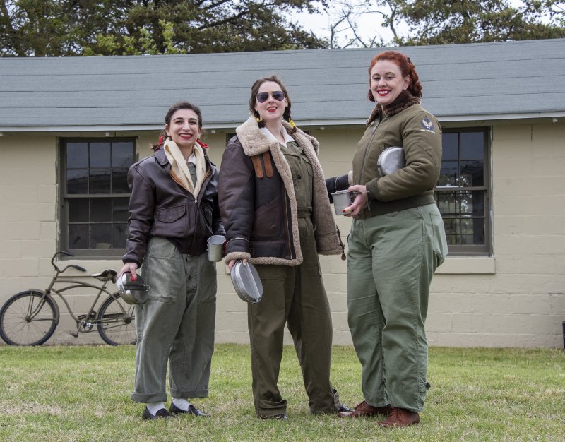 Fort Miles hosted members of the Historical Aviation Society posing in front of the mess hall. Shown are (l-r) Gabby Pesce of New York, Jess Husman of Pennsylvania and Nancy Llano of Virginia. DENY HOWETH PHOTOS